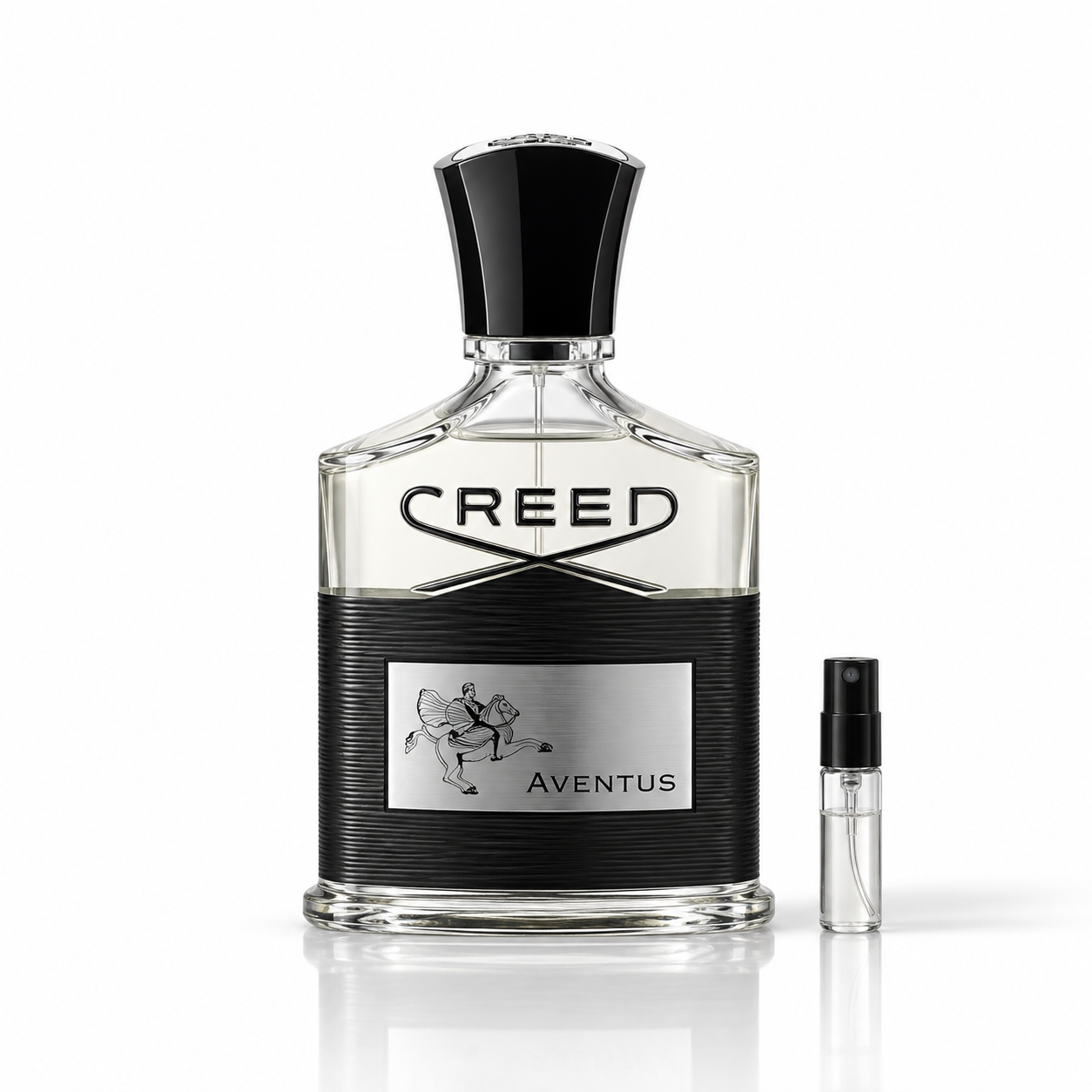 Creed Aventus bottle beside a 2ml decant